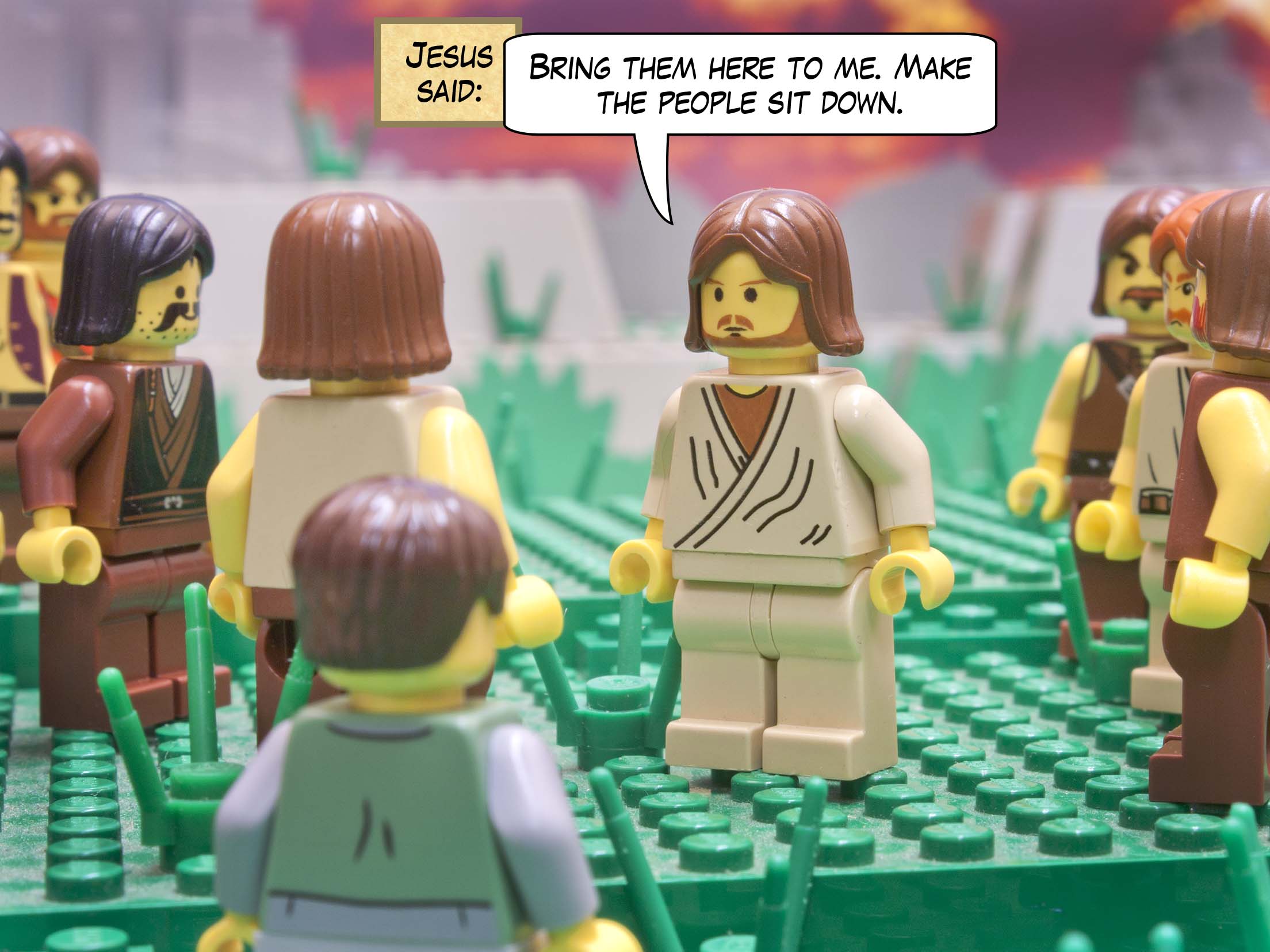 Then he ordered them to get all the people to sit down in groups on the green grass. So they sat down in groups of hundreds and of fifties.